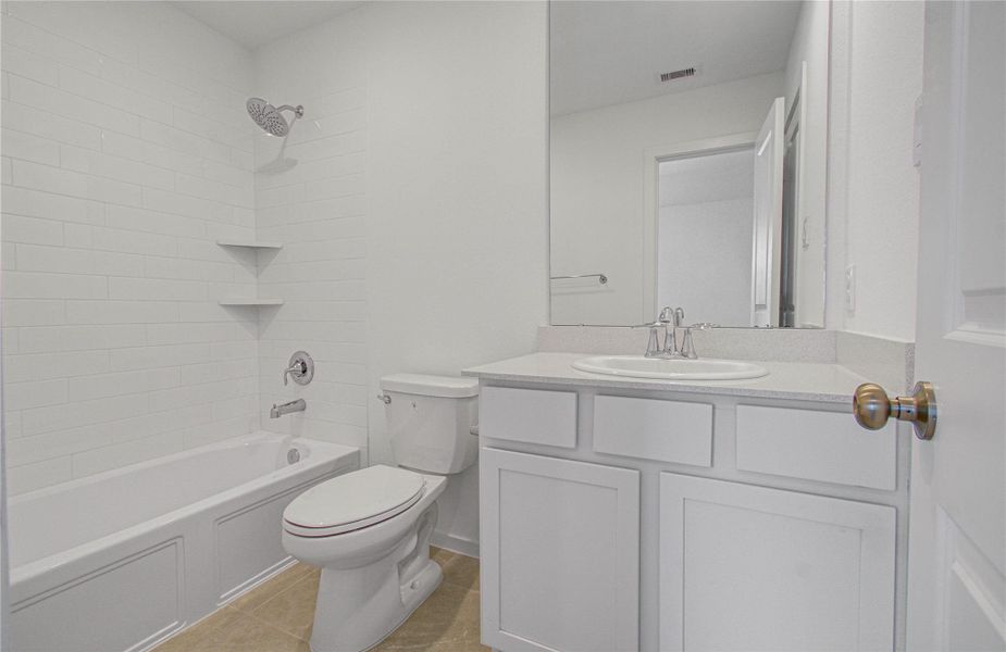 Furnished interior view inside a new home in Harvest Green, Richmond (Image 7).