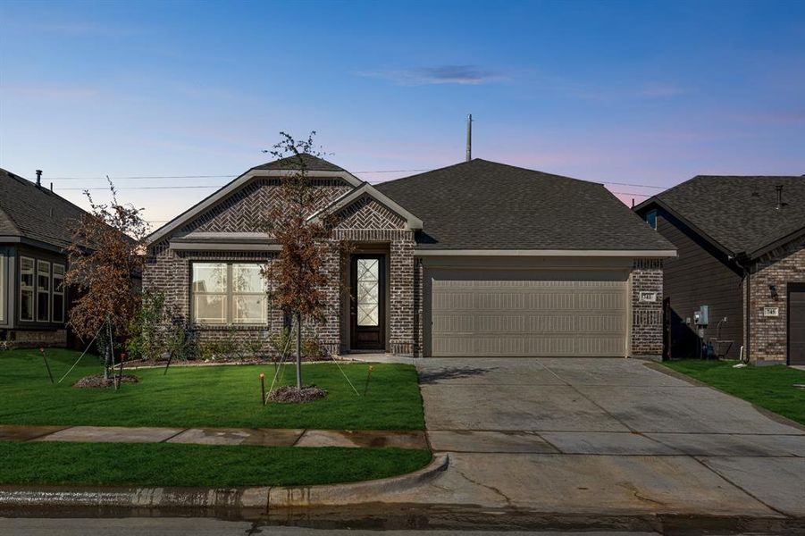 Front exterior of a new home in Godley Ranch Elements, Godley, TX, highlighting curb appeal (Image 2). Front exterior of a new home in Godley Ranch Elements, Godley, TX, highlighting curb appeal (Image 2).