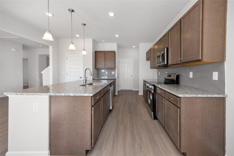 The Harrington- Kitchen. Sample image for illustration; upgrades, options, and colors may vary. The Harrington- Kitchen. Sample image for illustration; upgrades, options, and colors may vary.