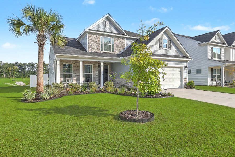 Front exterior of a new home in Parker's Preserve, Ridgeville, SC, highlighting curb appeal (Image 26).