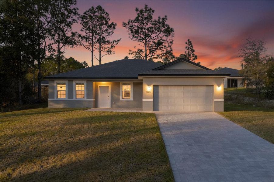 Front exterior of a new home in , Citrus Springs, FL, highlighting curb appeal (Image 22).