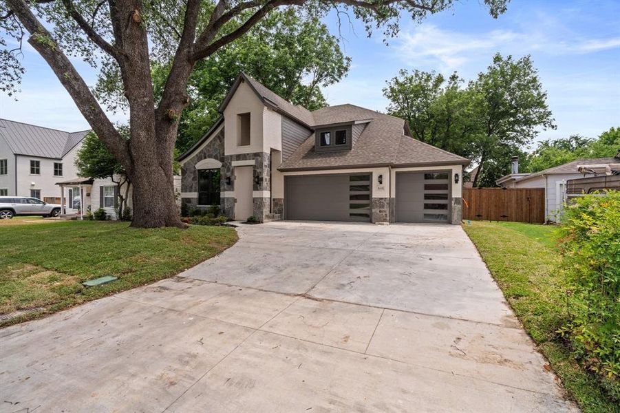 Front exterior of a new home in , Fort Worth, TX, highlighting curb appeal (Image 24). Front exterior of a new home in , Fort Worth, TX, highlighting curb appeal (Image 24).