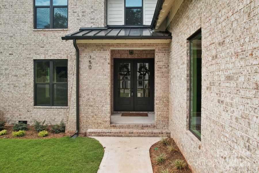 Exterior details and patio area of a home in , Charlotte (Image 3).