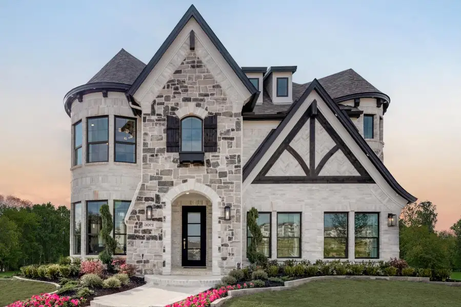 Representative exterior photo of a completed home built from the Grand Heritage by Grand Homes in Providence Cove, McKinney, TX (Image 2). Representative exterior photo of a completed home built from the Grand Heritage by Grand Homes in Providence Cove, McKinney, TX (Image 2).