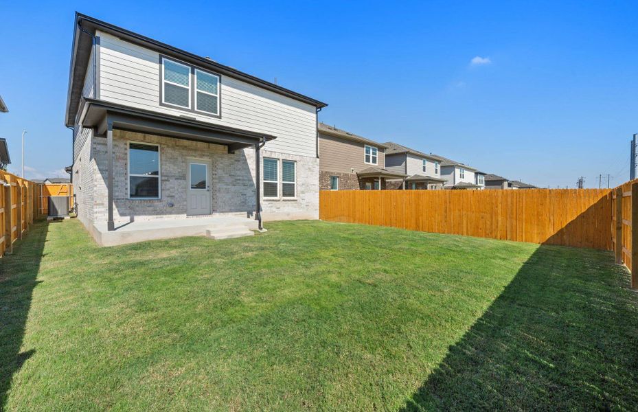 Exterior details and patio area of a home in Crosswinds, Kyle (Image 2). Exterior details and patio area of a home in Crosswinds, Kyle (Image 2).