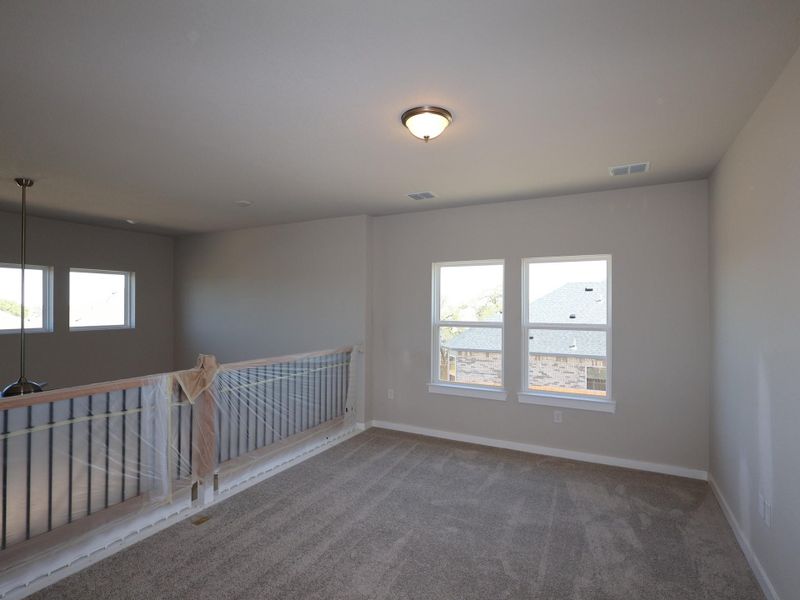 Spacious, unfurnished interior of a new home in Cedar Brook, Leander (Image 12).