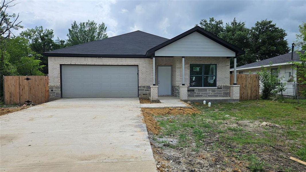 Front exterior of a new home in , Terrell, TX, highlighting curb appeal (Image 1). Front exterior of a new home in , Terrell, TX, highlighting curb appeal (Image 1).