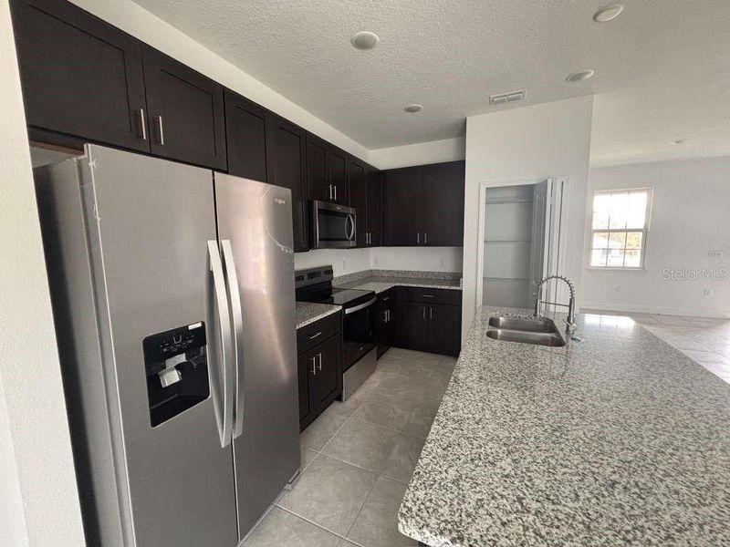 Furnished interior view inside a new home in , Citrus Springs (Image 9).