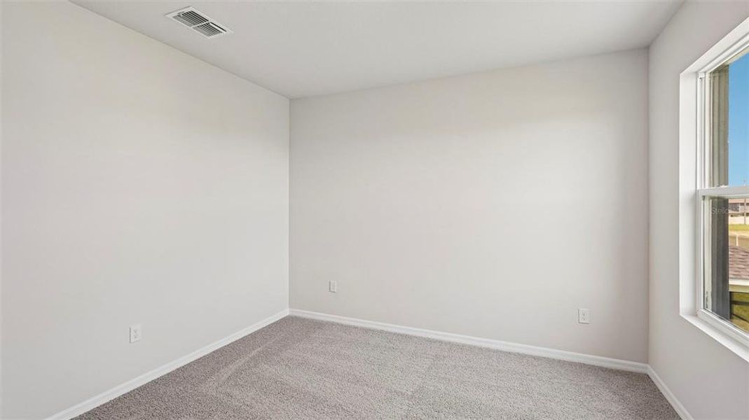 Spacious, unfurnished interior of a new home in Bella Lago, Parrish (Image 22).