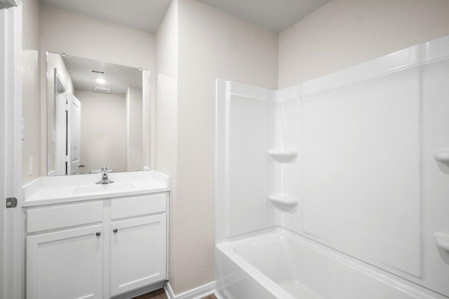 Secondary Bathroom comes with a shower and tub combo Secondary Bathroom comes with a shower and tub combo