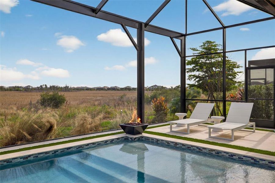 Exterior details and patio area of a home in Wild Blue at Waterside, Sarasota (Image 3).