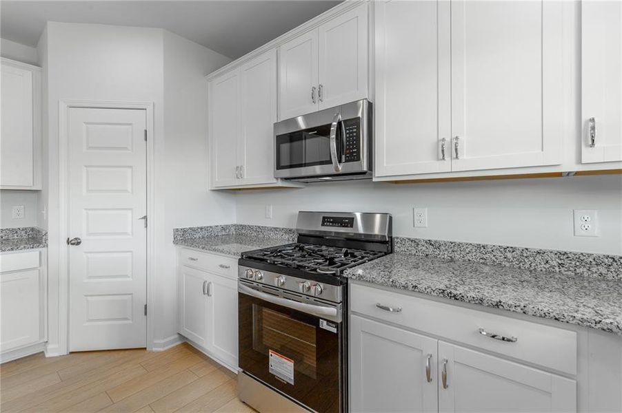 Furnished interior view inside a new home in Capstone Estates, Apison (Image 6).