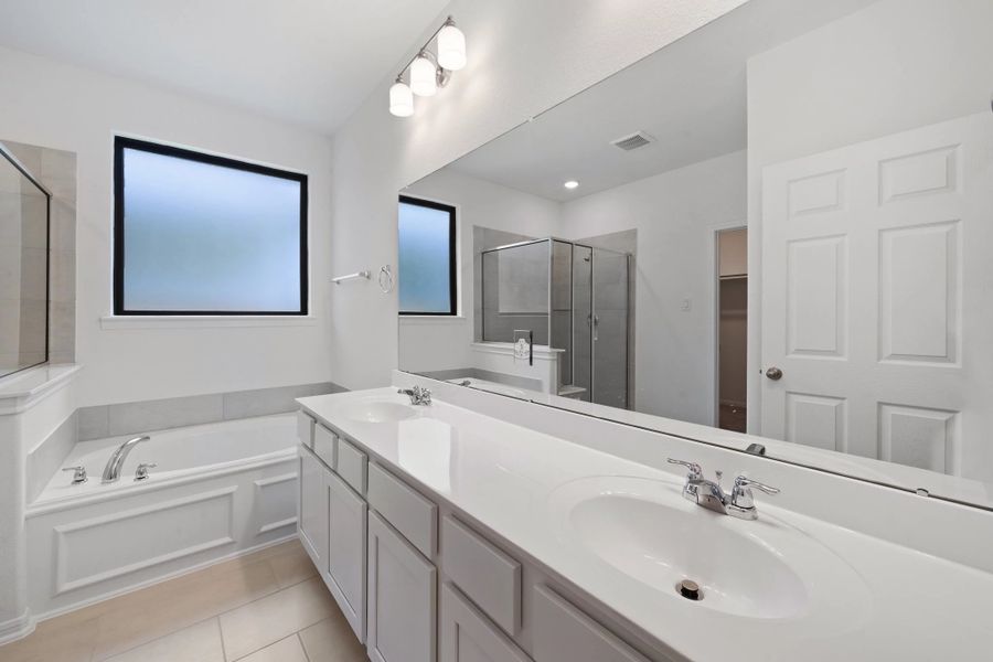 Furnished interior view inside a new home in Spring Creek Trails, Magnolia (Image 8).