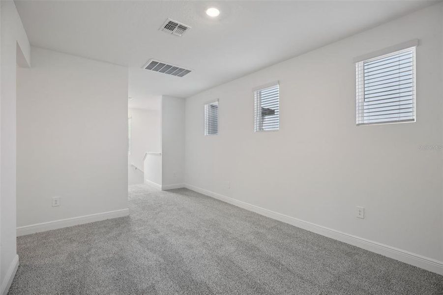 Spacious, unfurnished interior of a new home in Cyrene at Minneola - Villas, Minneola (Image 18).