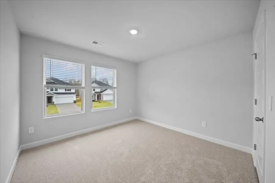 Spacious, unfurnished interior of a new home in Riverwood Farm, Piedmont (Image 19).