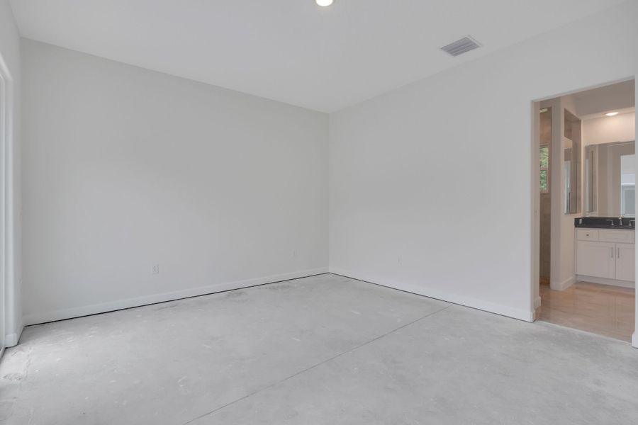 Representative unfurnished interior of a home built from the The Courtyard Junior by ABD Development in Toscana, Palm Coast (Image 31).