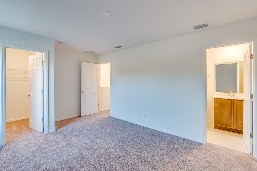 Spacious, unfurnished interior of a new home in Orchard Park Townhomes, St. Augustine (Image 4).