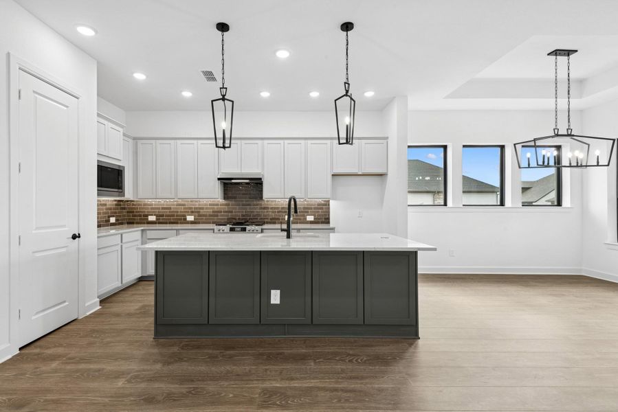 Furnished interior view inside a new home in Riceland - Enclave Row Collection, Mont Belvieu (Image 12).
