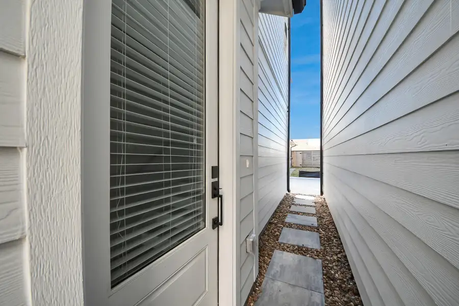 Exterior details and patio area of a home in , Houston (Image 26). Exterior details and patio area of a home in , Houston (Image 26).