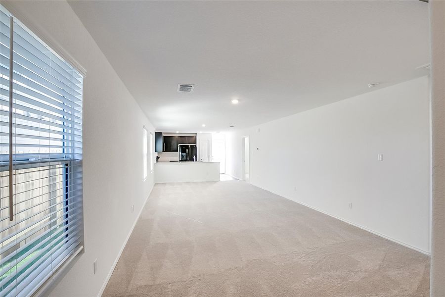 Spacious, unfurnished interior of a new home in Bastrop Grove: Stonehill Collection, Bastrop (Image 12).