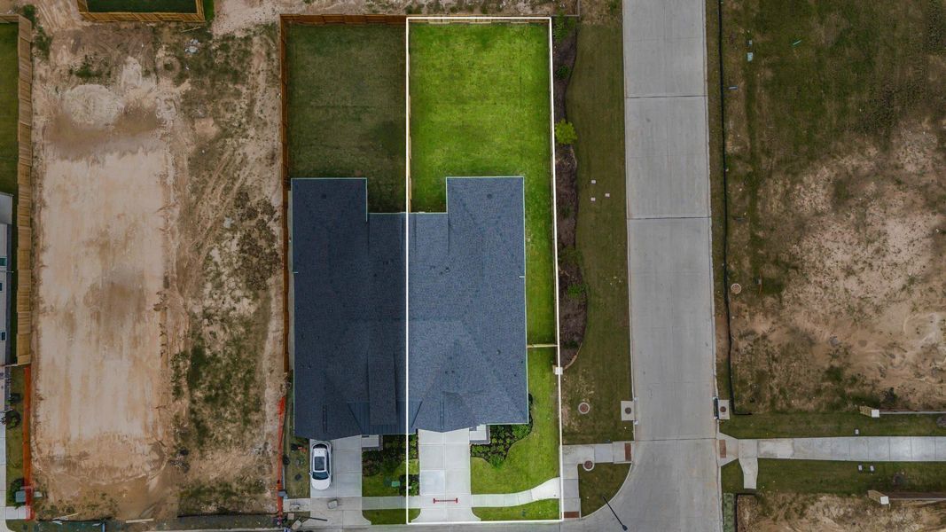 This home sits on a large CORNER lot with ample yard space in front and the back, lush landscaping and well-maintained yard!