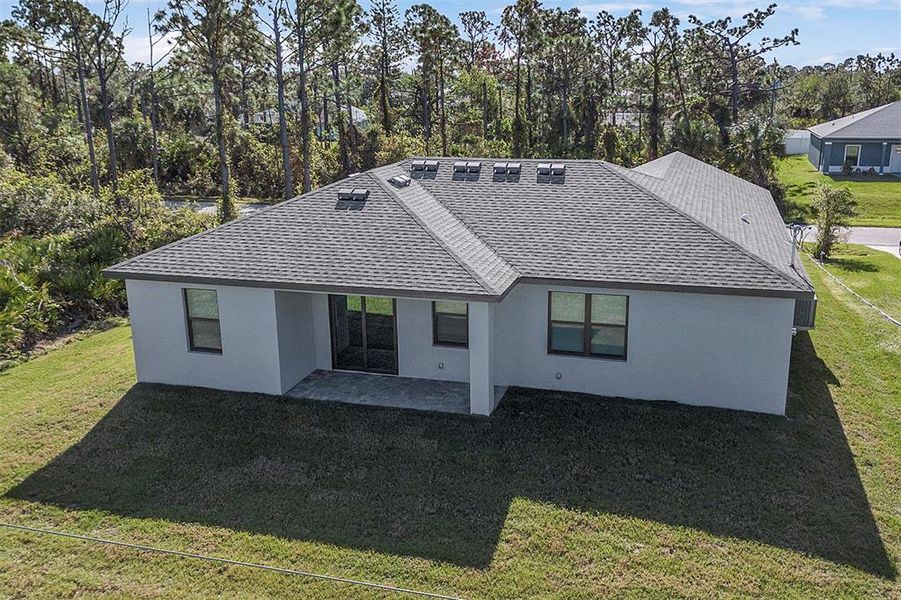 Front exterior of a new home in Lake Gallagher Estates, Dover, FL, highlighting curb appeal (Image 1).