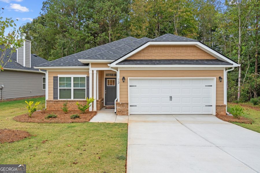 Exterior details and patio area of a home in Canterbury Villas, Carrollton (Image 1).