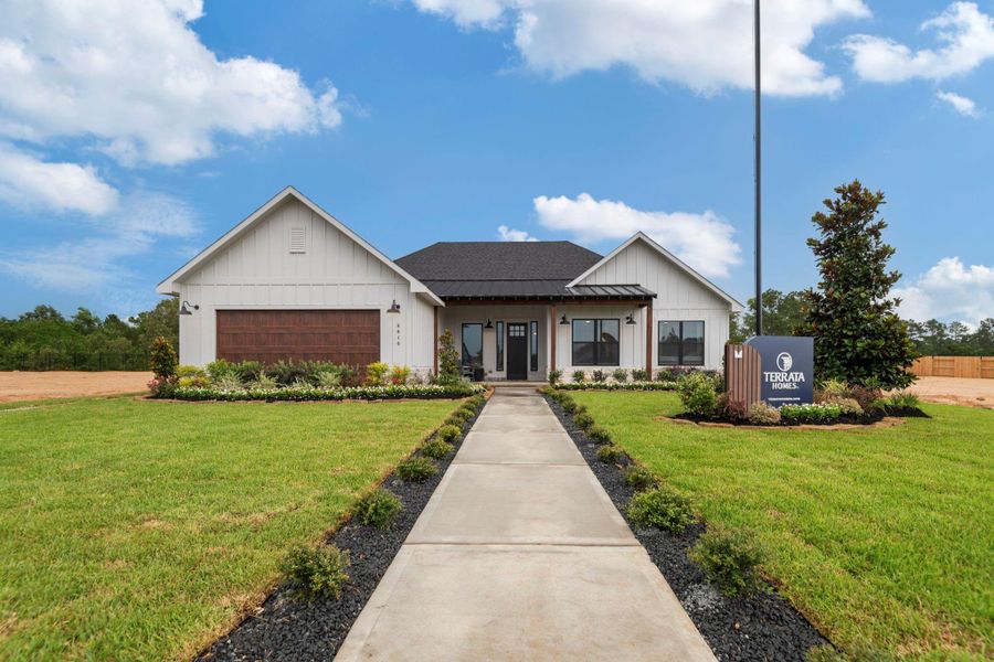 Front exterior of a new home in , Magnolia, TX, highlighting curb appeal (Image 1). Front exterior of a new home in , Magnolia, TX, highlighting curb appeal (Image 1).