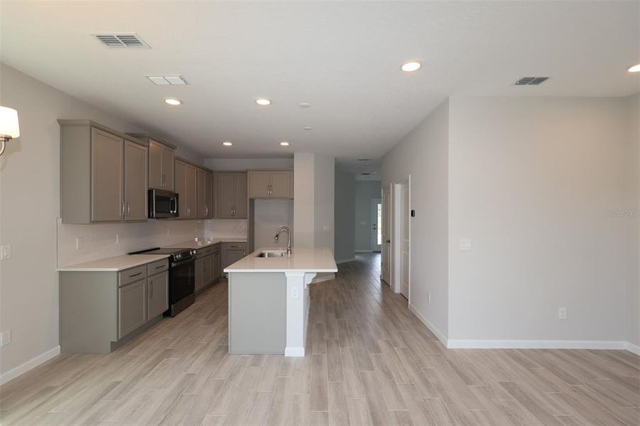 Furnished interior view inside a new home in Center Lake on the Park, St. Cloud (Image 9).