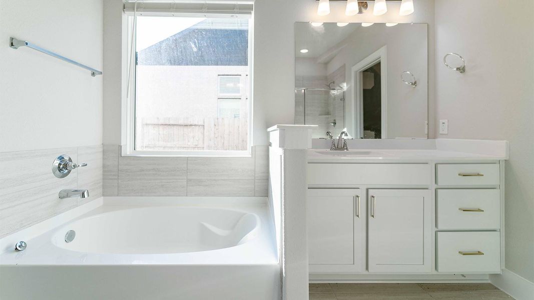 Furnished interior view inside a new home in Sunterra, Katy (Image 2).