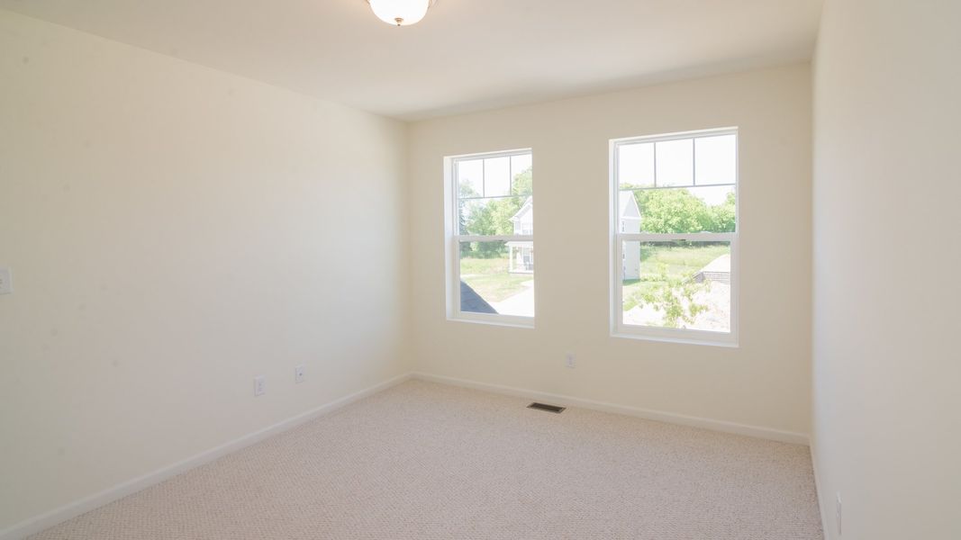 Representative unfurnished interior of a home built from the The Briarhaven III Side Entry by Norfolk Homes in Fosdick Glen of Saline, Saline (Image 65).