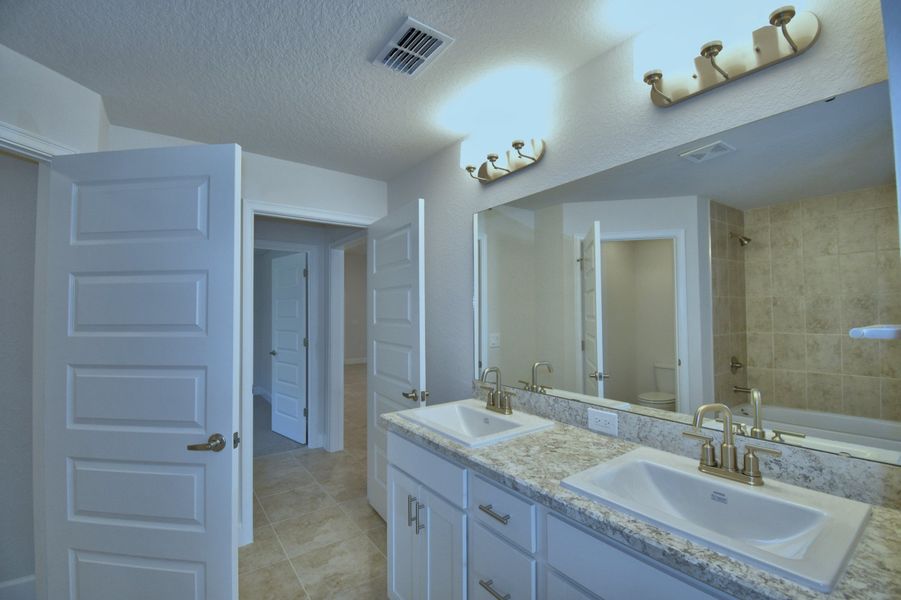 Furnished interior view inside a new home in Villamar, Winter Haven (Image 9).