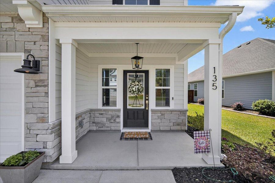 Exterior details and patio area of a home in Hewing Farms, Summerville (Image 27).