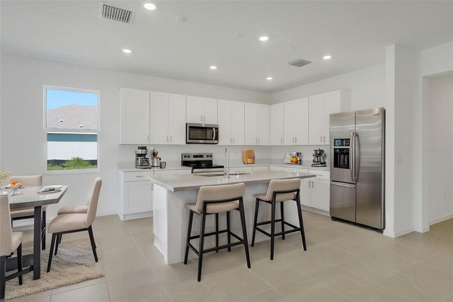 Furnished interior view inside a new home in Willowbrook North, Winter Haven (Image 12).