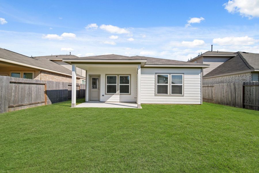 Exterior details and patio area of a home in Willow Trace 45' at Willow Trace, Spring (Image 22).