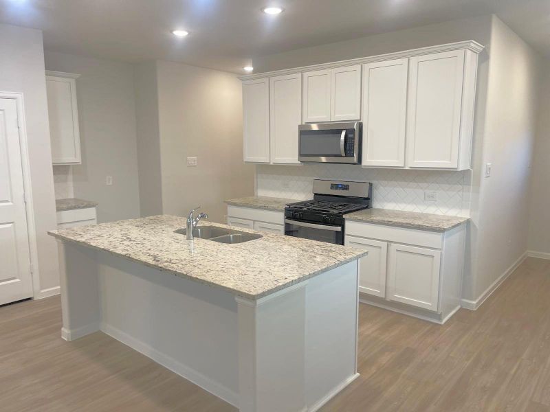 Furnished interior view inside a new home in Lakes at Black Oak, Magnolia (Image 6). Furnished interior view inside a new home in Lakes at Black Oak, Magnolia (Image 6).