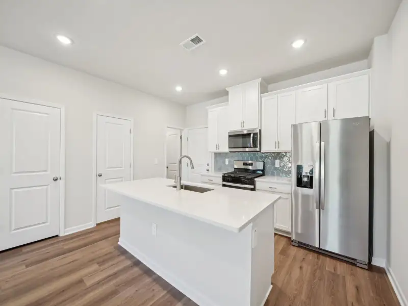 Furnished interior view inside a new home in The Rows at Buffaloe Reserve, Raleigh (Image 3).