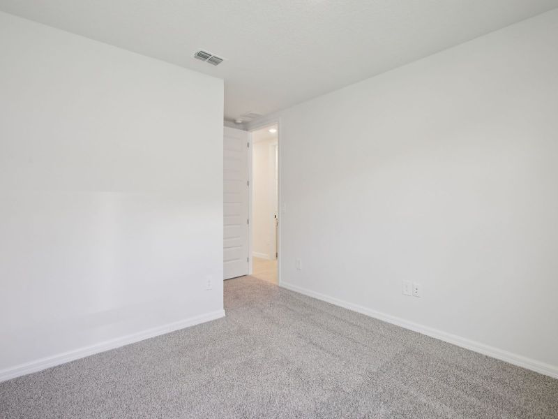 Spacious, unfurnished interior of a new home in Two Rivers - Signature Series, Zephyrhills (Image 9).