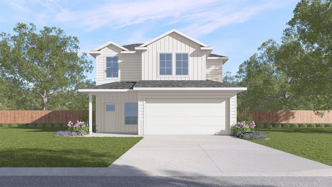 View of front of house with a garage and a front yard