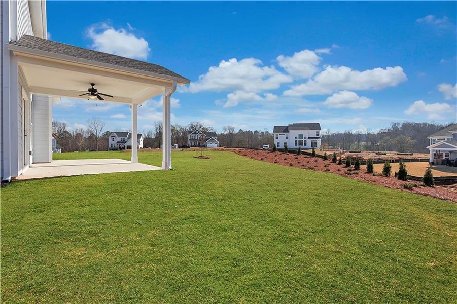 Exterior details and patio area of a home in Twin Lakes, Hoschton (Image 4).
