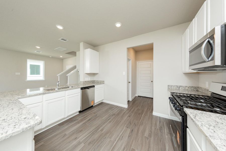 Furnished interior view inside a new home in Cliffstone Hills, Conroe (Image 5).