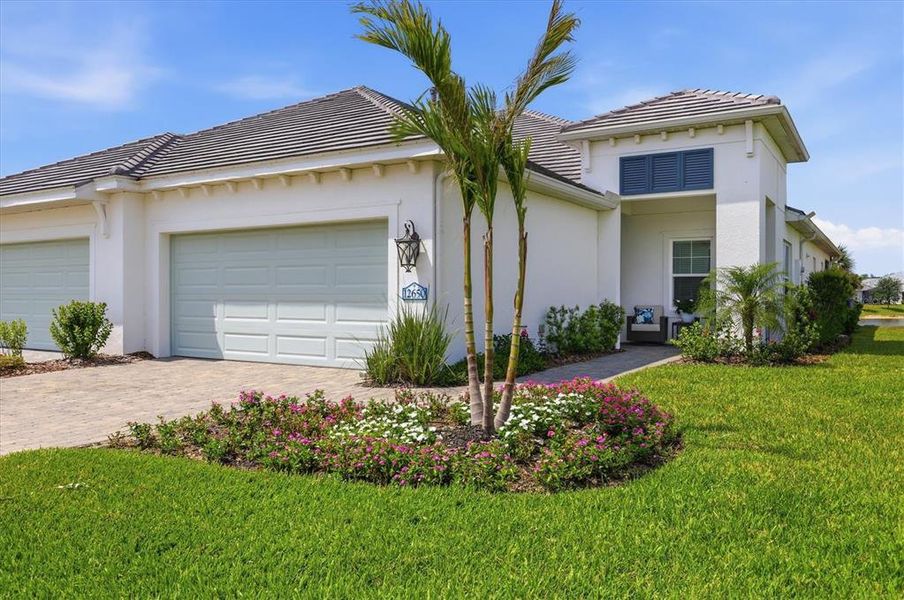 Front exterior of a new home in , Venice, FL, highlighting curb appeal (Image 1). Front exterior of a new home in , Venice, FL, highlighting curb appeal (Image 1).