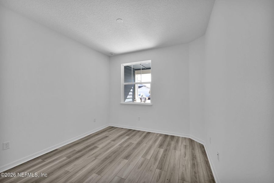 Spacious, unfurnished interior of a new home in Del Webb Wildlight, Yulee (Image 20).