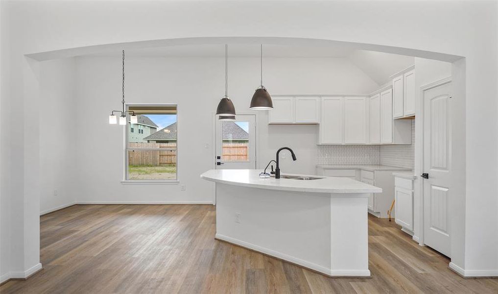 View of kitchen and dining area (*Photo not of actual home and used for illustration purposes only.)