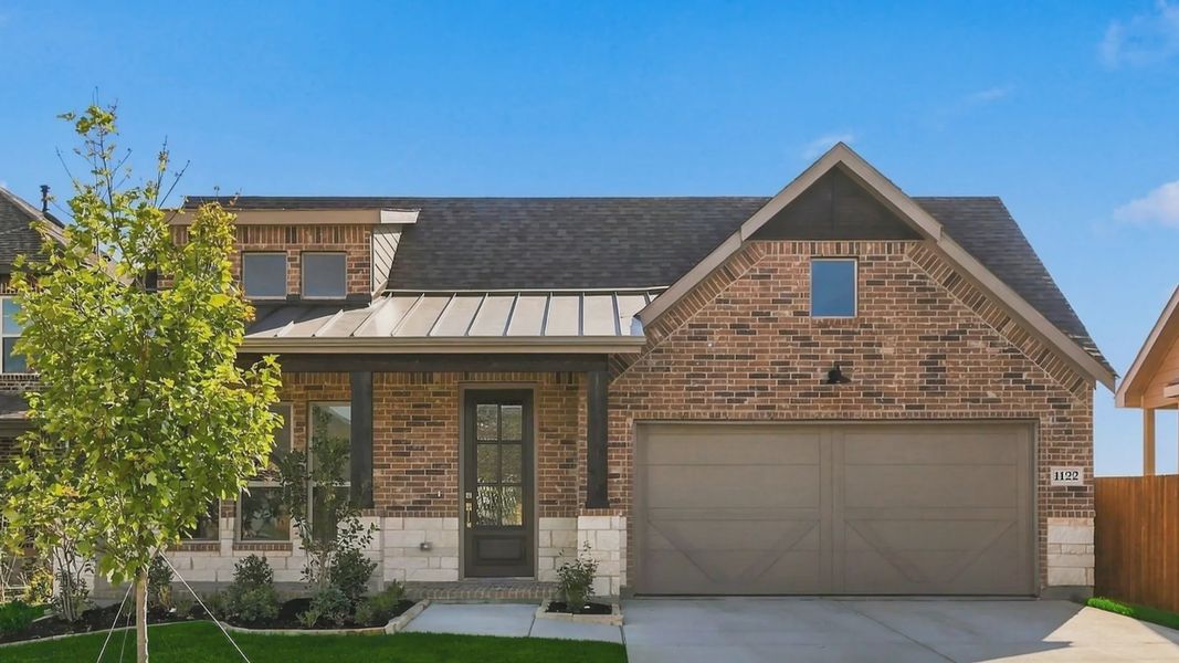 Front exterior of a new home in The Oaks, Red Oak, TX, highlighting curb appeal (Image 21).