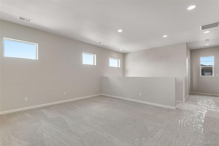 Spacious, unfurnished interior of a new home in Crescendo Collection at Reunion, Commerce City (Image 25). Spacious, unfurnished interior of a new home in Crescendo Collection at Reunion, Commerce City (Image 25).