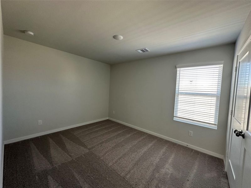 Spacious, unfurnished interior of a new home in Lonestar Collection at Aurora, Katy (Image 24).