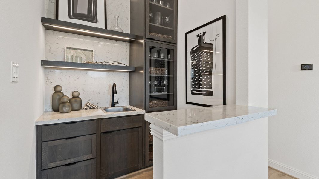 Representative furnished interior of a home built from the Oleander by Brightland Homes in Sunterra, Katy (Image 10).