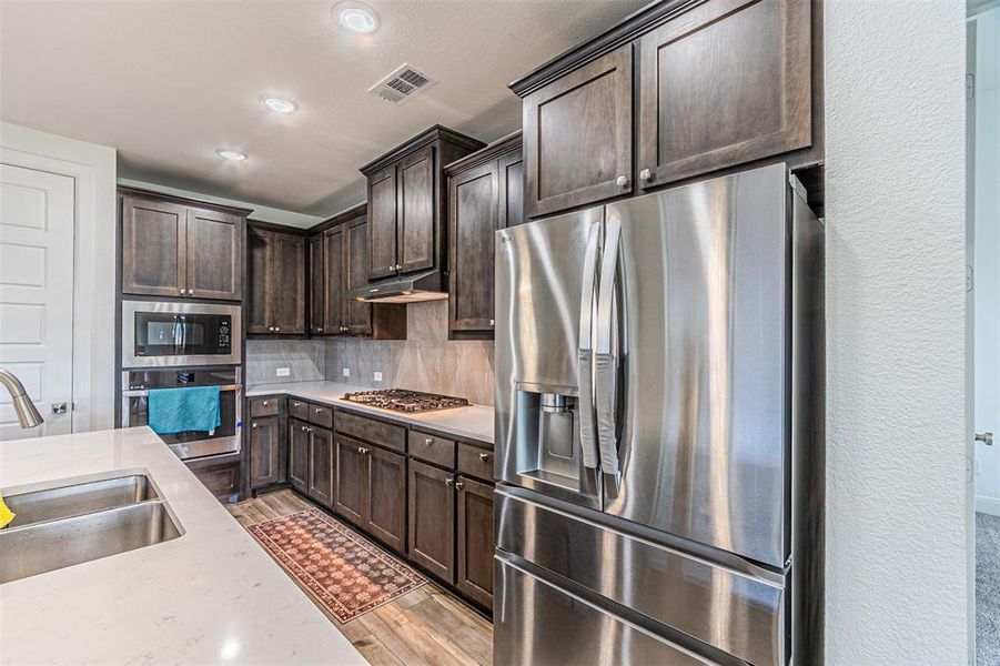Furnished interior view inside a new home in , Aubrey (Image 30).