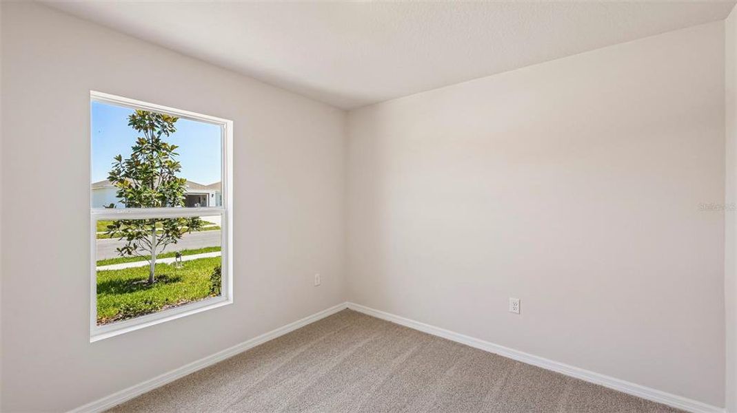 Spacious, unfurnished interior of a new home in Oakfield Lakes, Palmetto (Image 24).